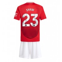 Maglia Calcio Manchester United Luke Shaw #23 Prima Divisa Bambino 2024-25 Manica Corta (+ pantaloncini)